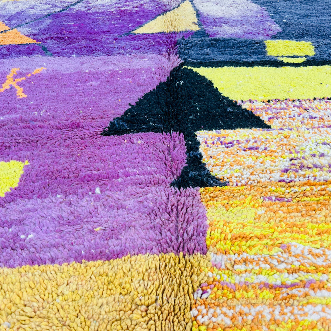 Vintage Moroccan rug with purple, yellow, and orange patterns, inspired by desert sunsets. Handmade wool Berber carpet, 238x161 cm.