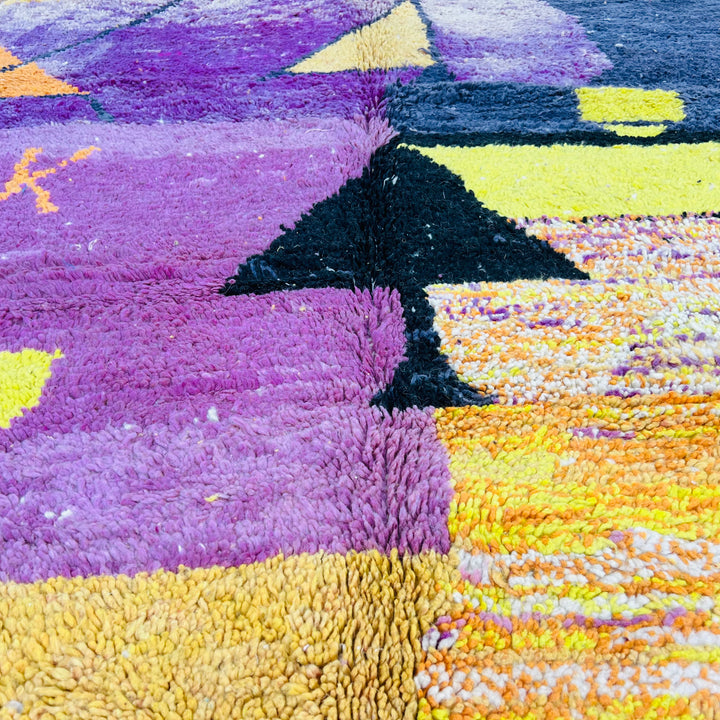 Vintage Moroccan rug with purple, yellow, and orange patterns, inspired by desert sunsets. Handmade wool Berber carpet, 238x161 cm.