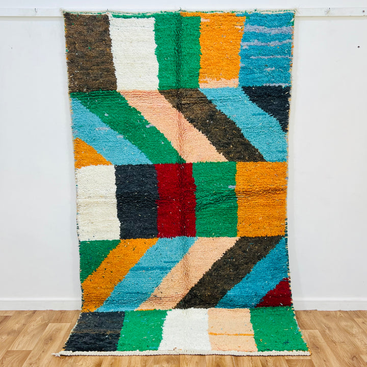 Color Block Vintage Moroccan Rug with vibrant red, green, orange, and blue diagonal patterns, handwoven by Berber artisans.