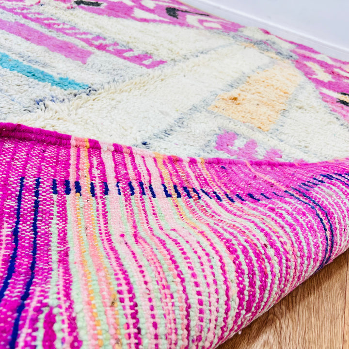 Pink Vintage Moroccan Rug with tribal designs, handmade by Berber artisans, size 264x162 cm. Perfect for adding cultural depth.