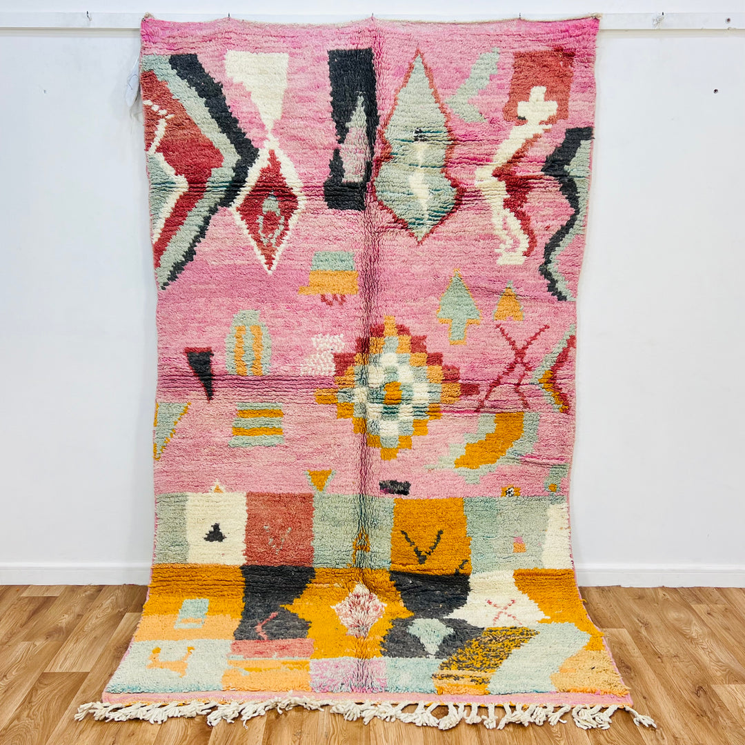 Vintage Pink Moroccan Rug with tribal patterns and geometric symbols, handcrafted by Berber women. Size: 248 x 154 cm.