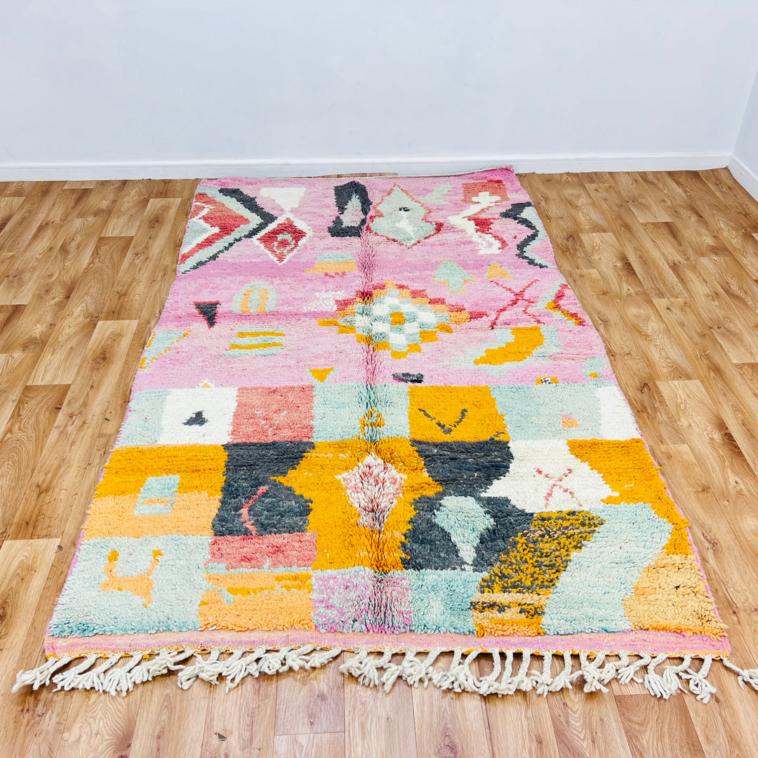 Vintage Pink Moroccan Rug with geometric symbols and tribal patterns, handmade by Berber women, 248 x 154 cm, traditional decor.