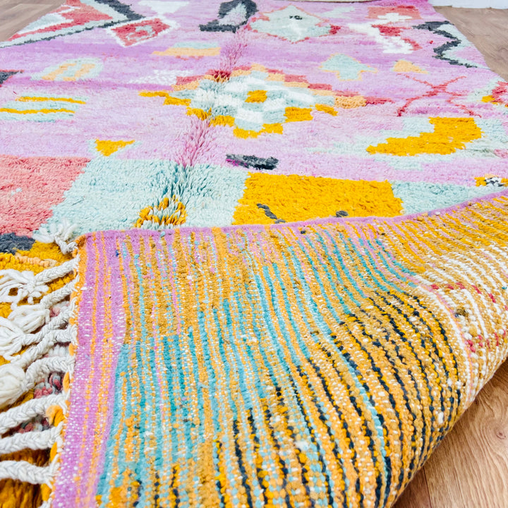 Vintage Pink Moroccan Rug with tribal patterns in orange, mustard, and mint, handmade by Berber women, size 248x154 cm.
