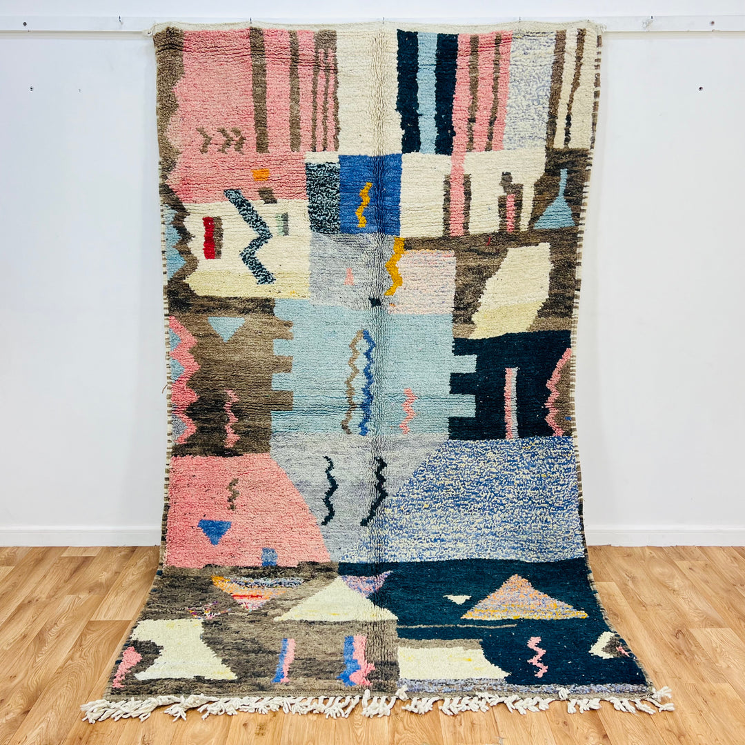 Colorful Vintage Moroccan Rug with geometric motifs in fuchsia, mustard, brown, and blue, handwoven by Berber artisans.
