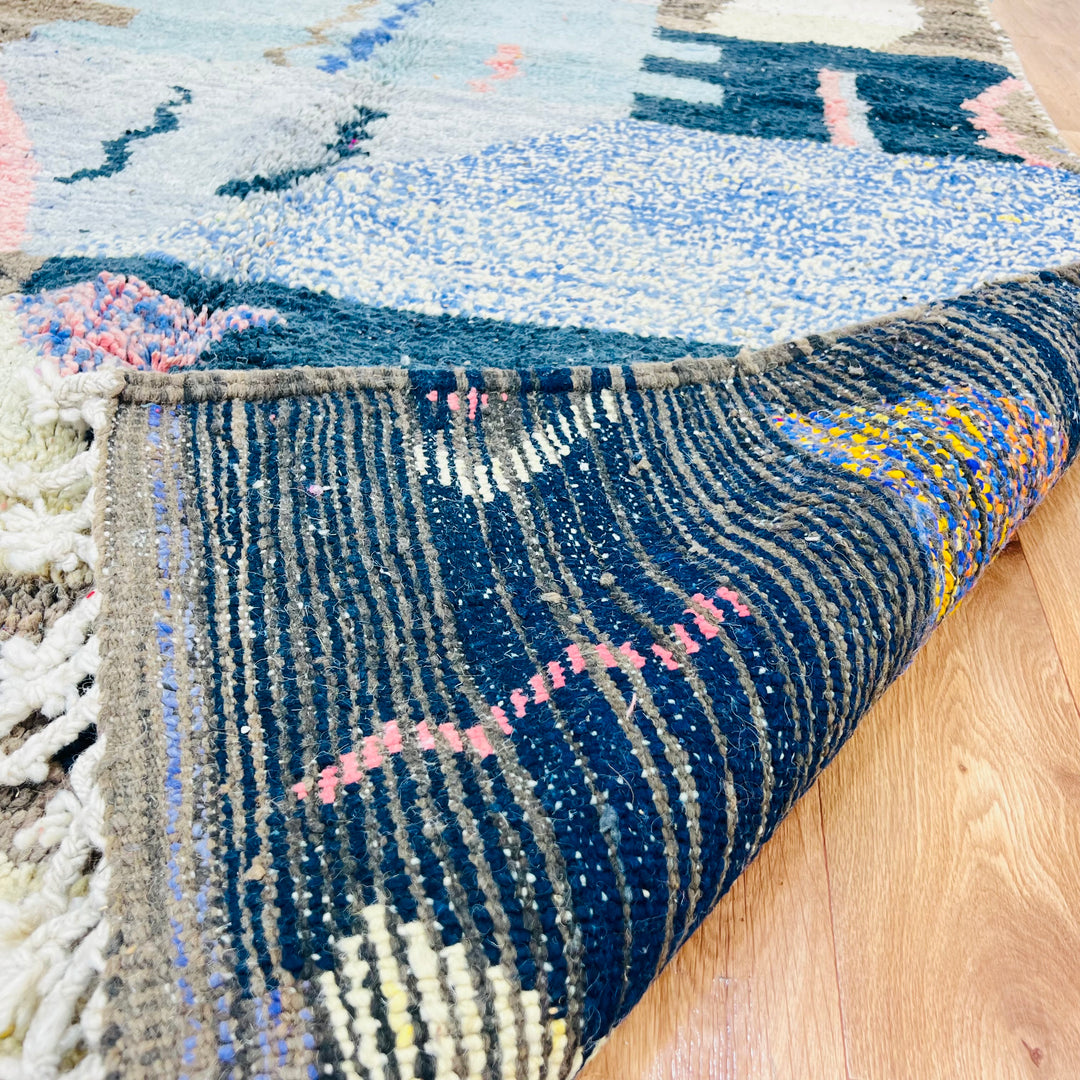 Colorful Vintage Moroccan Rug showcasing intricate patterns in fuchsia, mustard, brown, and blue, handwoven wool by Berber artisans.