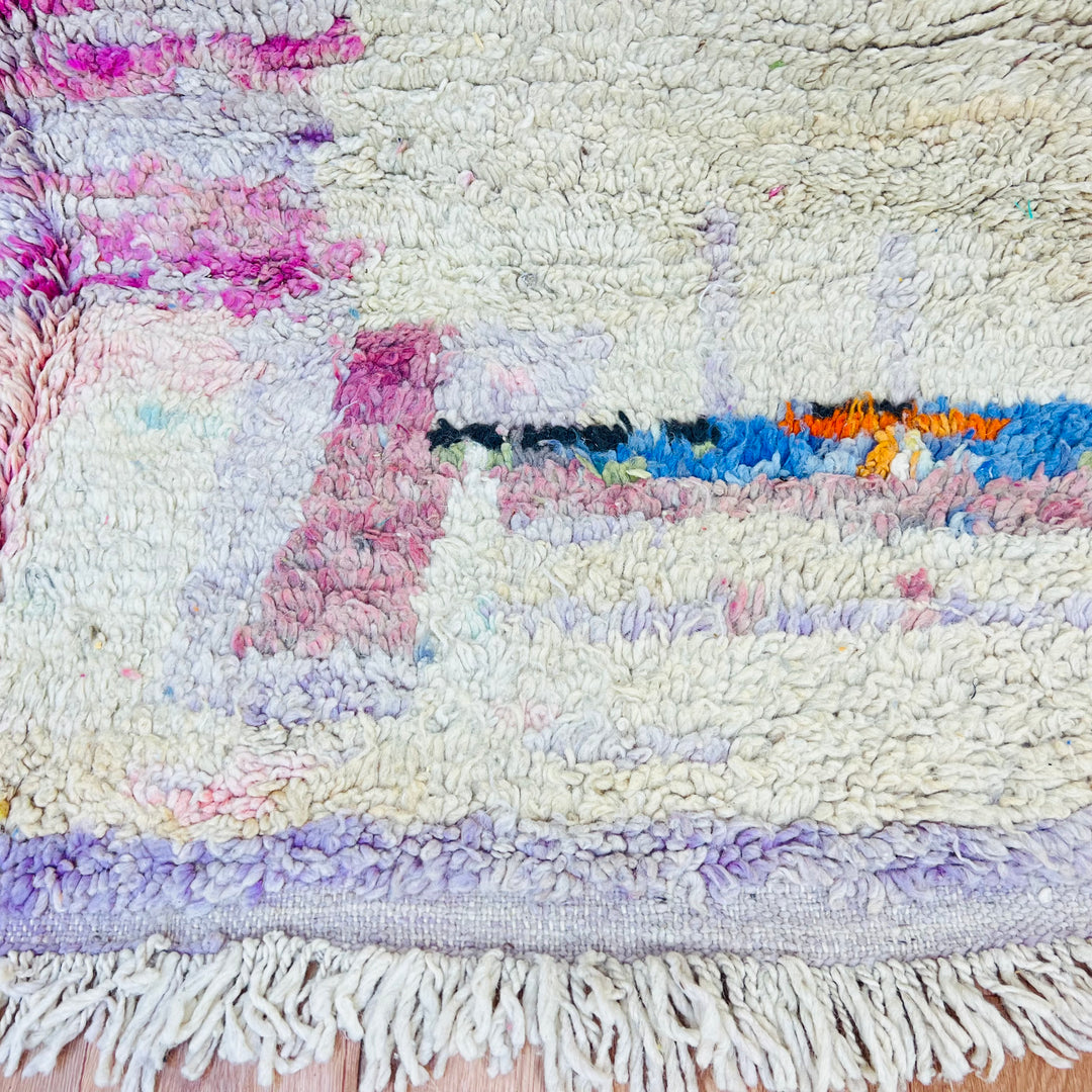 Pastel abstract Moroccan wool rug with lavender, blue, and orange motifs, handmade by Berber artisans. 8.1 x 5 ft.