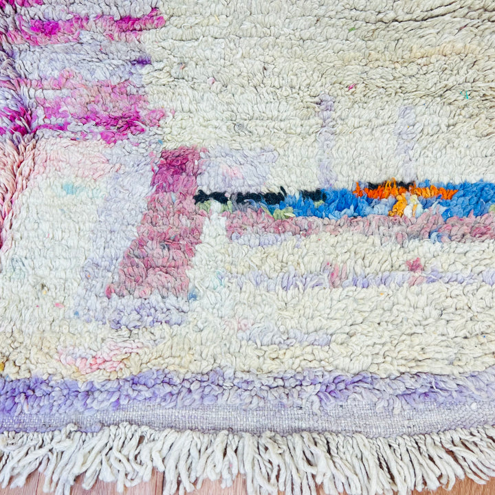 Pastel abstract Moroccan wool rug with lavender, blue, and orange motifs, handmade by Berber artisans. 8.1 x 5 ft.