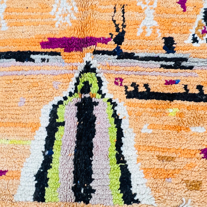 Close-up of Diamond Tribal Moroccan Wool Rug with vibrant saffron, fuchsia, and lime tones. Moroccan berber rug.