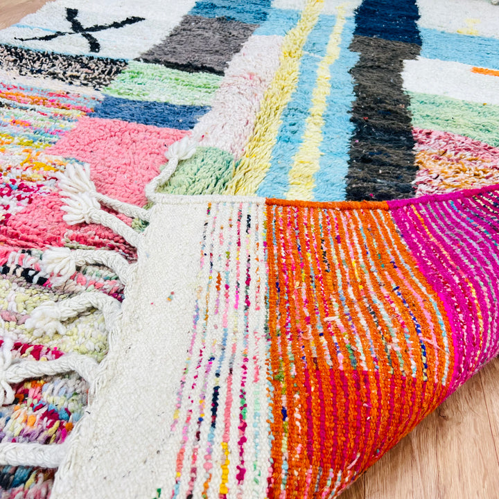 Colorful Moroccan Berber Wool Rug with vibrant abstract patterns and tassels, perfect for enhancing modern spaces. 247x154cm size.