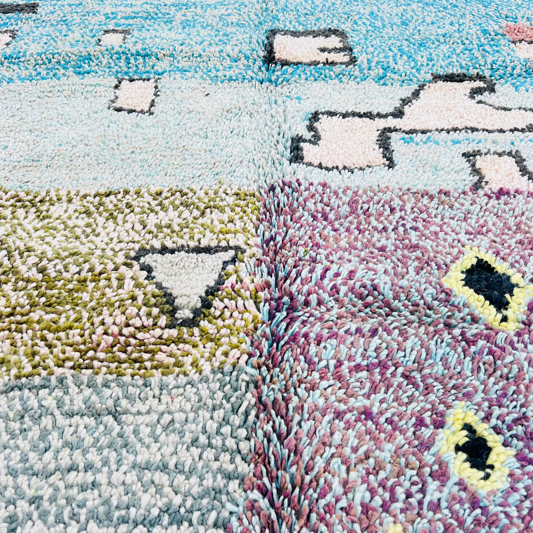 Colorful handwoven vintage Moroccan rug with geometric patterns, showcasing Berber artistry in teal and earth tones.