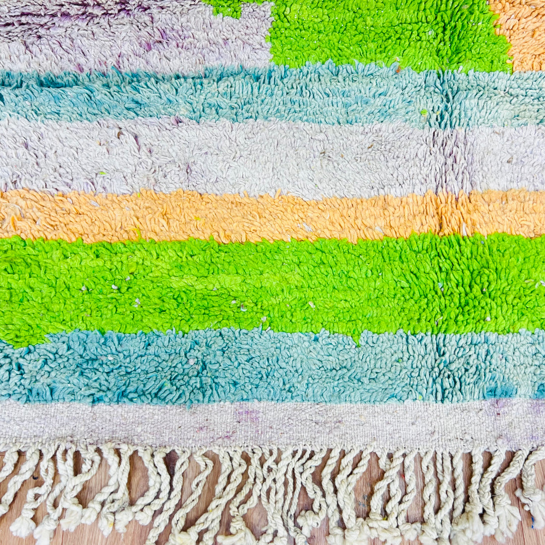 Color Block Moroccan Rug in vibrant green, orange, and ivory stripes, handmade from wool by Berber women, 260 x 163 cm.