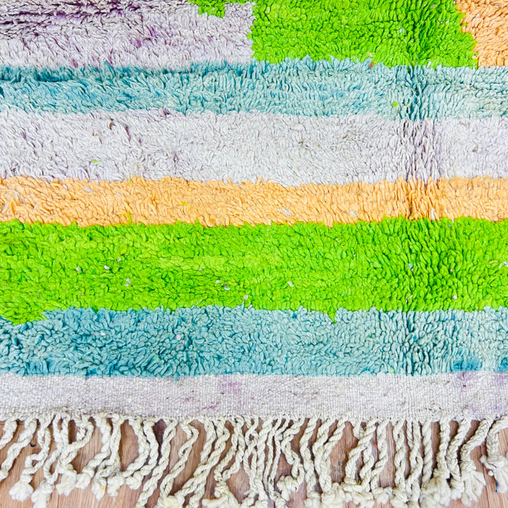 Color Block Moroccan Rug in vibrant green, orange, and ivory stripes, handmade from wool by Berber women, 260 x 163 cm.