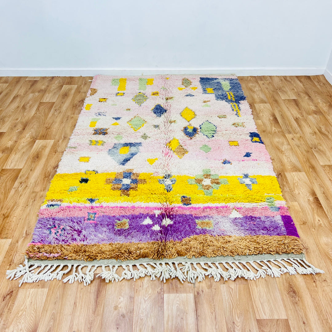 Pink and yellow vintage Moroccan rug with Berber symbols and tribal motifs, handmade with natural wool, 237x152 cm.