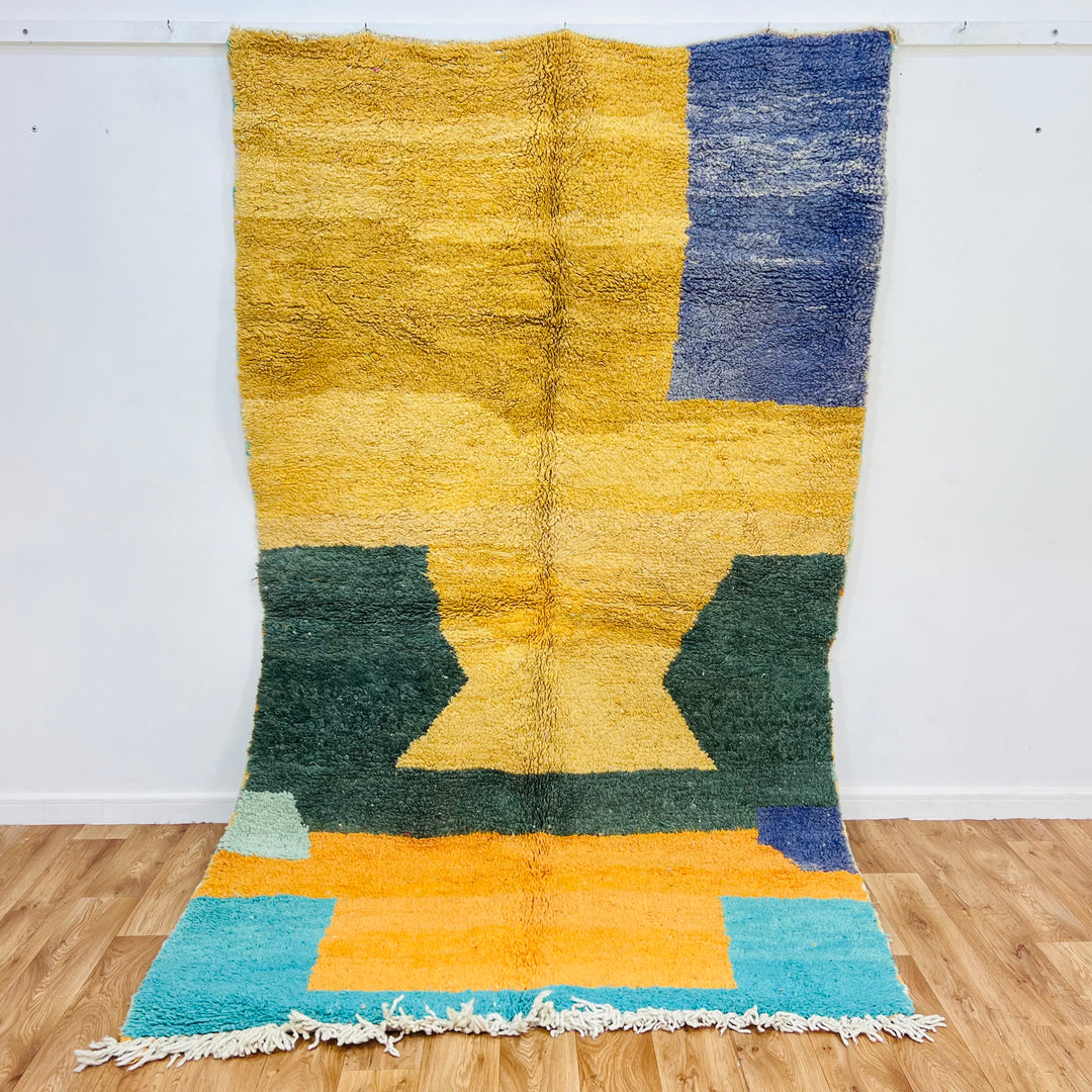 Yellow and green abstract Moroccan rug with geometric patterns, handmade from 100% wool, 8.8x5 ft. Moroccan Berber style.