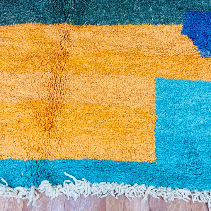 Yellow and green abstract Moroccan rug, 269x153 cm, featuring geometric patterns and vibrant colors, handmade wool by Berber artisans.