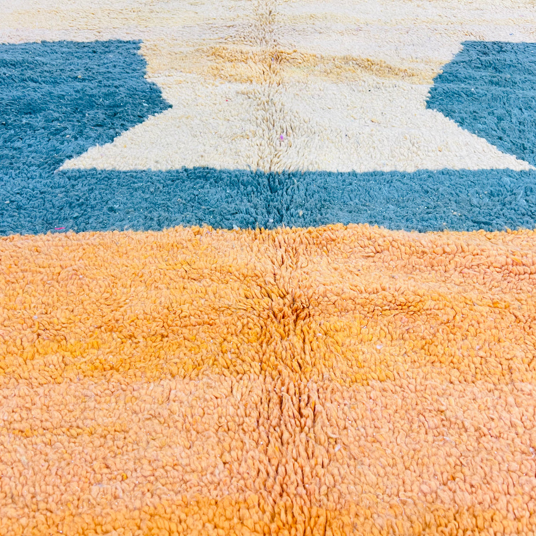 Abstract Moroccan rug in golden yellow, aqua, and orange, handmade with wool. Ideal for colorful decor. Moroccan Berber style.