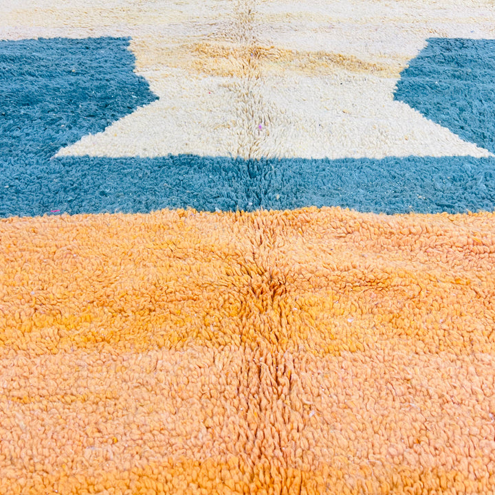 Abstract Moroccan rug in golden yellow, aqua, and orange, handmade with wool. Ideal for colorful decor. Moroccan Berber style.