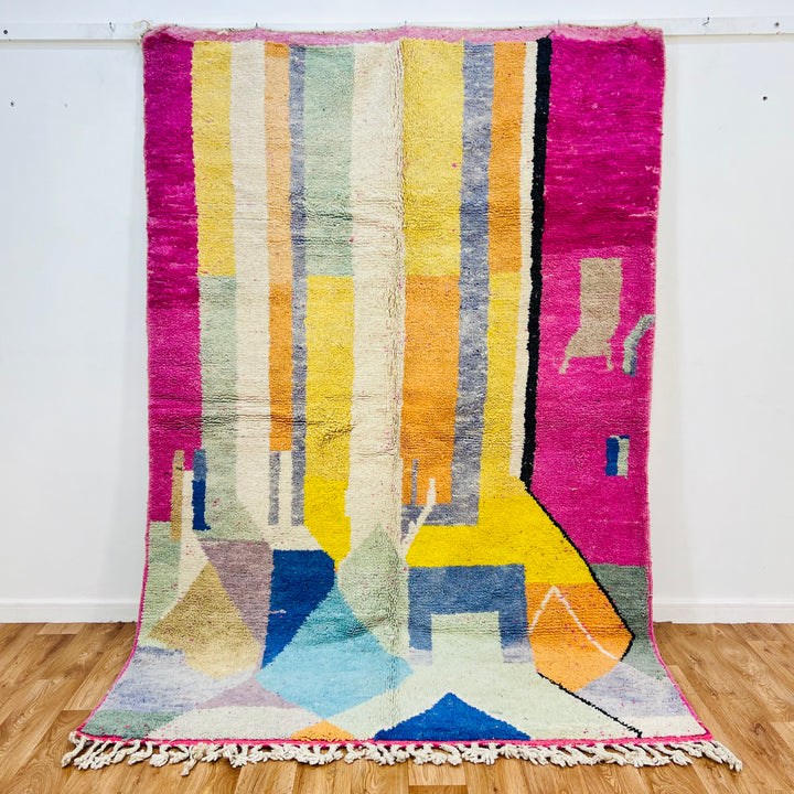 Modern Abstract Moroccan Wool Rug in pink, yellow, and blue geometric design, handmade by Berber women from 100% natural wool.