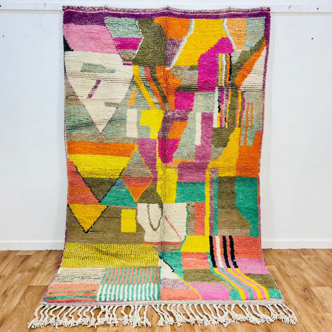 Colorful Patchwork Abstract Moroccan Wool Rug with geometric and abstract designs in vibrant hues, size 259x150 cm.