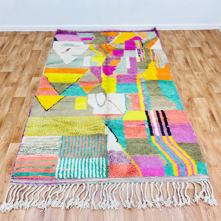 Colorful Patchwork Abstract Moroccan Wool Rug with geometric patterns, 259x150 cm. Handwoven by Berber women. Moroccan rugs for sale.