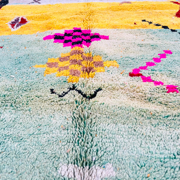 Playful Moroccan Berber Wool Rug with vibrant colors, tribal symbols, and checkered patterns. Handmade traditional area rug.