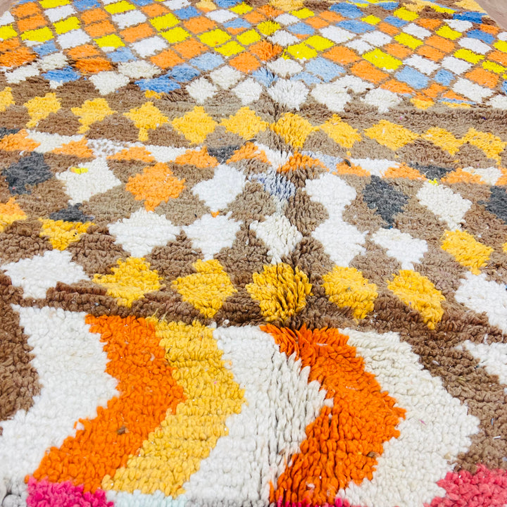 Diamond &amp; Zigzag Moroccan Wool Rug 268x161 cm with vibrant patterns in yellow, brown, sky blue, and sunset tones.