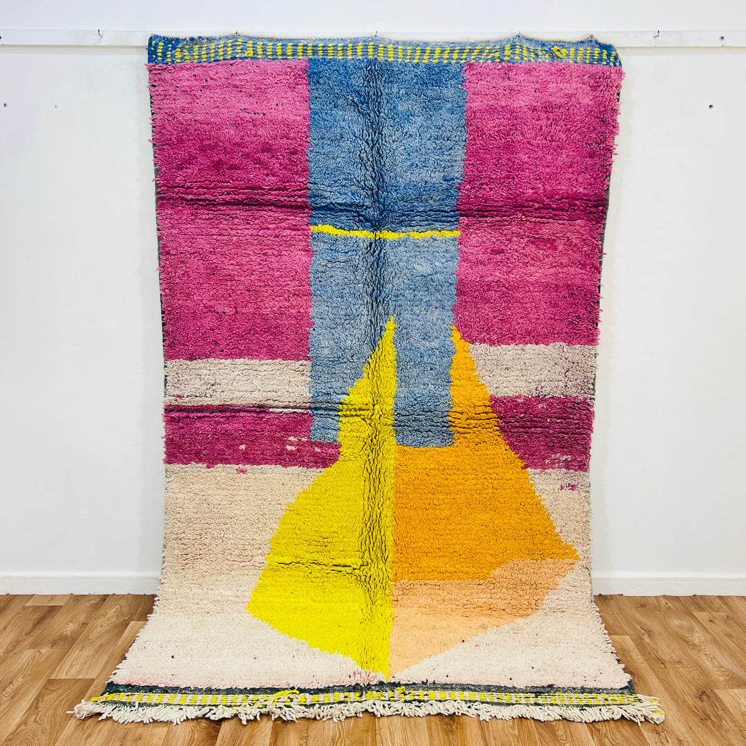 Vintage abstract Moroccan wool rug with pink, blue, yellow, orange; geometric Berber design. 258 x 155 cm.