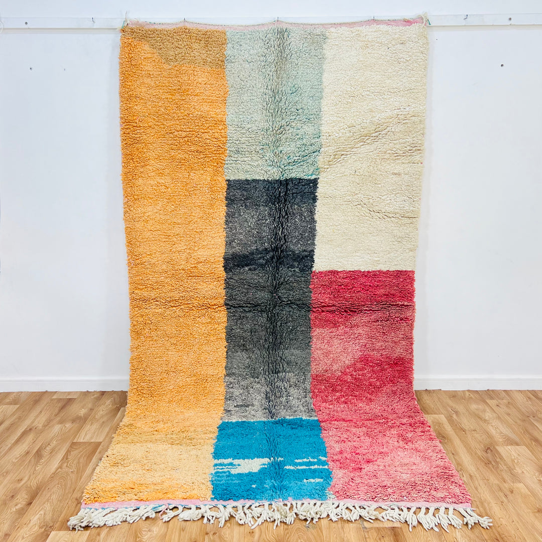 Vintage Moroccan rug 280x155 cm with color block design in burnt orange, turquoise, cream, black, and red. Handmade Berber carpet.
