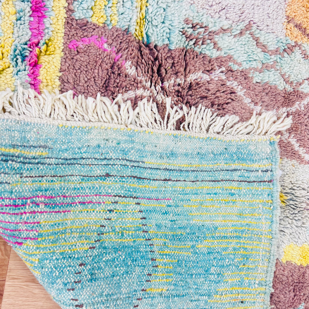 Vintage Moroccan rug in pastel colors with diamond motifs and fringe, handmade with wool. Dimensions: 235x156 cm.