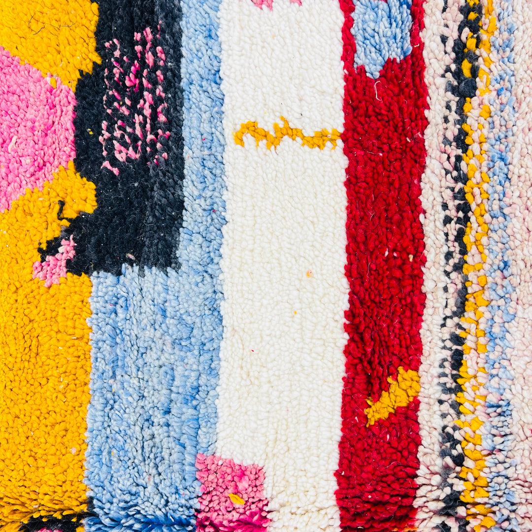 Vintage Moroccan rug with vibrant red, blue, and yellow abstract patterns, Berber symbols, handwoven wool. 247 x 154 cm.
