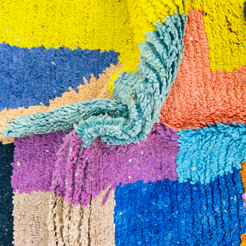 Vintage Moroccan wool rug with bold color block design in yellow, pink, blue, and more. Handwoven by Berber artisans. 254 x 155 cm.