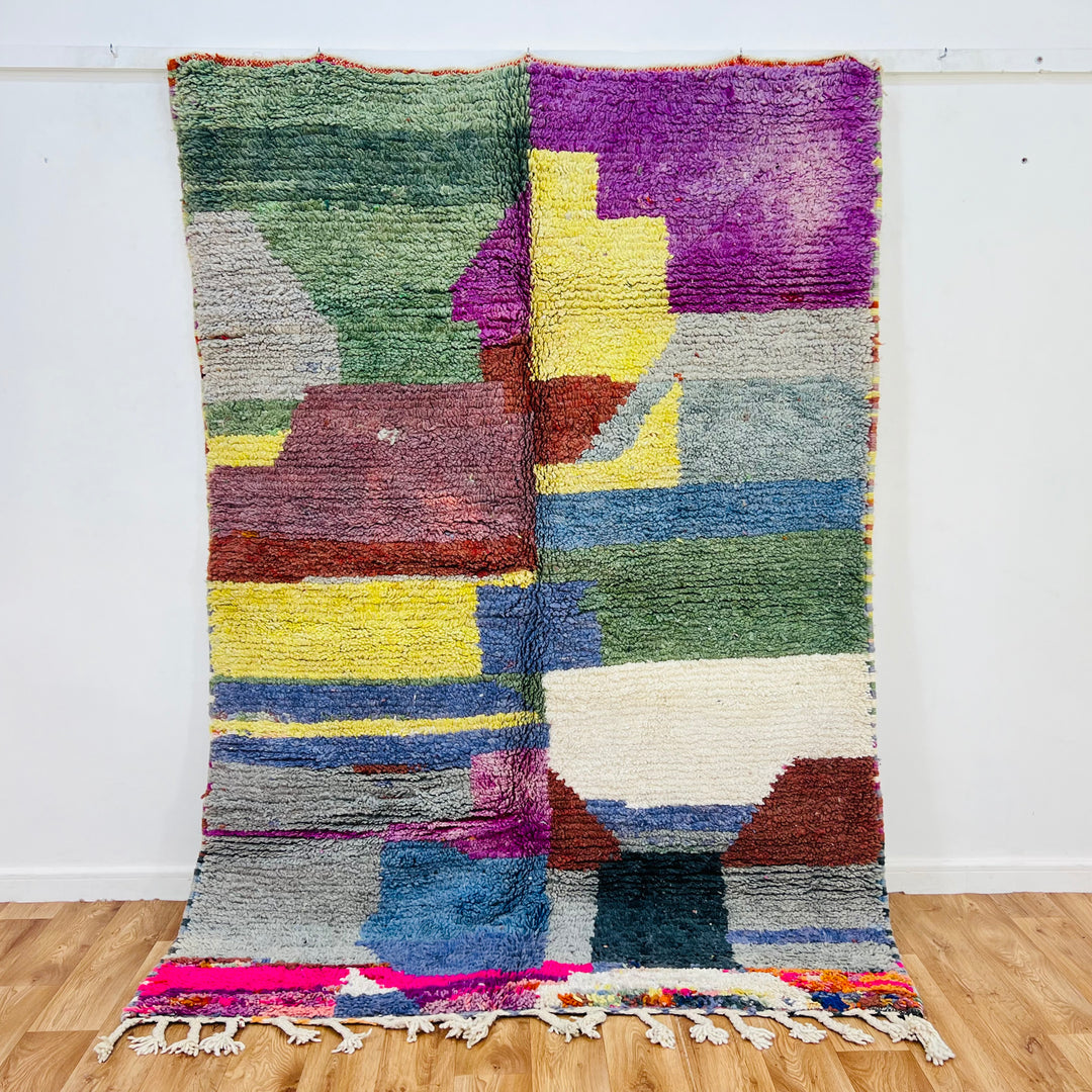 Handwoven vintage Moroccan rug with abstract color blocks in green, purple, yellow, and blue (231×152 cm) by Berber artisans