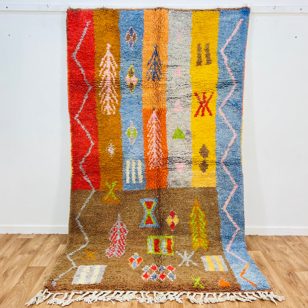 Handmade vintage Moroccan rug with Berber symbols in earthy tones of brown, red, yellow, blue, and orange, size 263 x 150 cm.