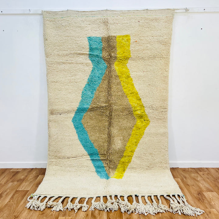 Minimalist vintage Moroccan wool rug with diamond motif in blue, brown, yellow. Handmade Berber carpet, 244x153 cm. Moroccan rugs for sale.