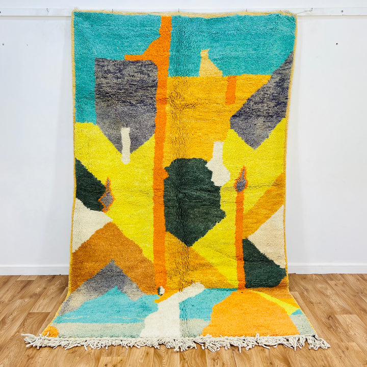 Vintage Moroccan rug with bold abstract pattern in turquoise, mustard, green, and orange colors, handwoven Berber style, 260x160 cm.