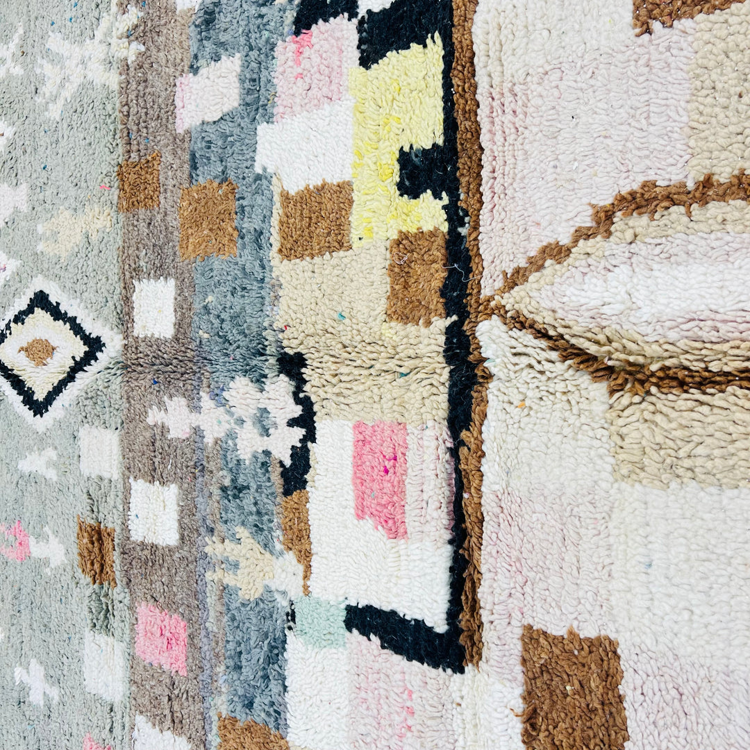 Vintage Moroccan Berber rug with geometric patterns in olive, blush, mustard, and ivory. Handmade by Berber artisans. 258x154 cm.