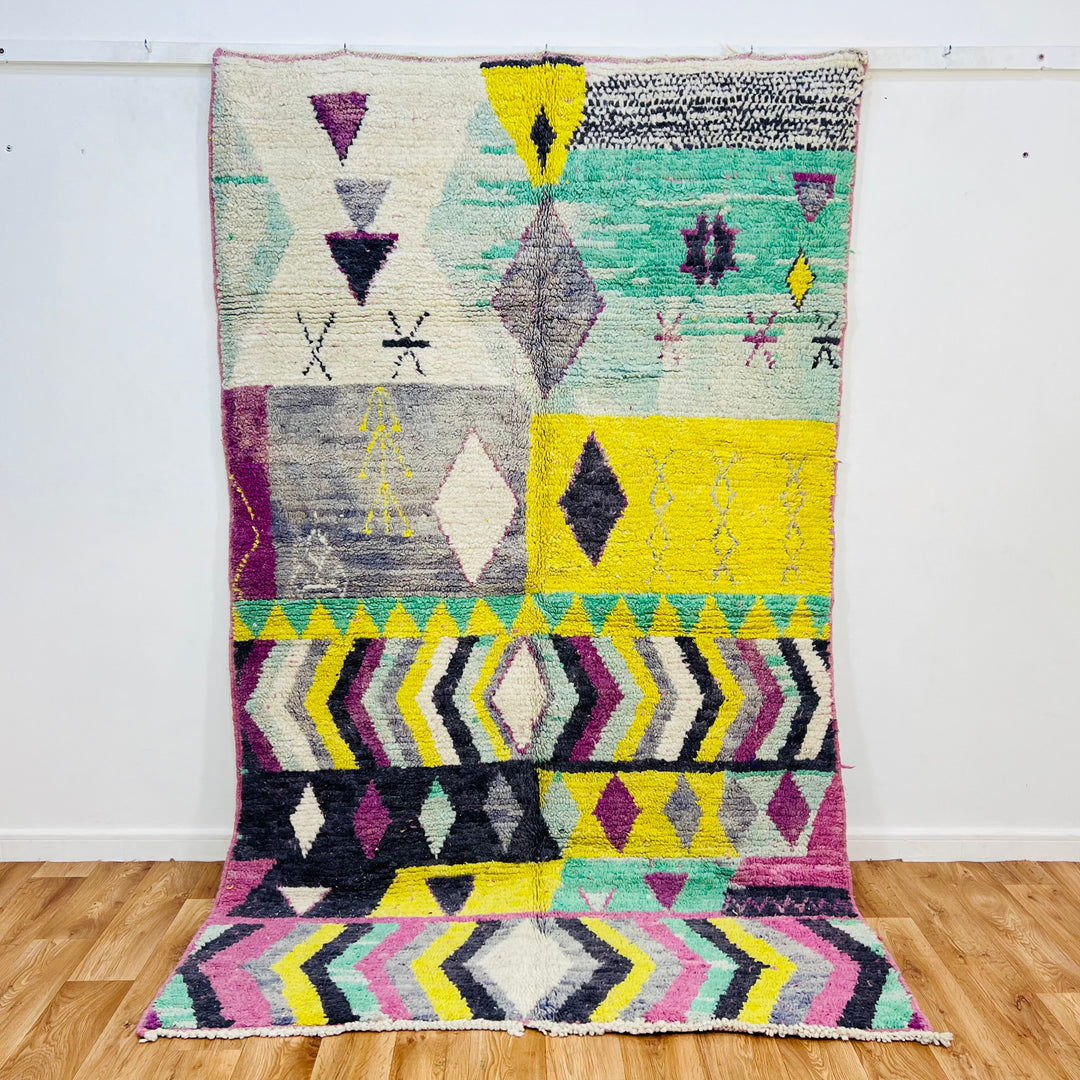 Vintage Moroccan Berber rug with colorful diamond and zigzag patterns, handwoven, 250x153 cm. Traditional wool area rug from Morocco.