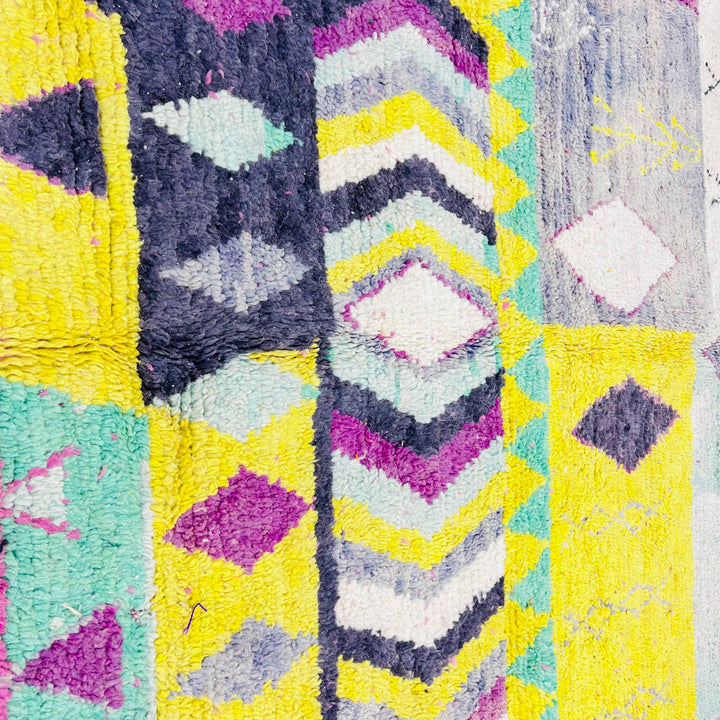 Vintage Moroccan rug with bright yellow, purple, aqua, and cream zigzag pattern, handwoven by Berber artisans. Size: 250x153 cm.