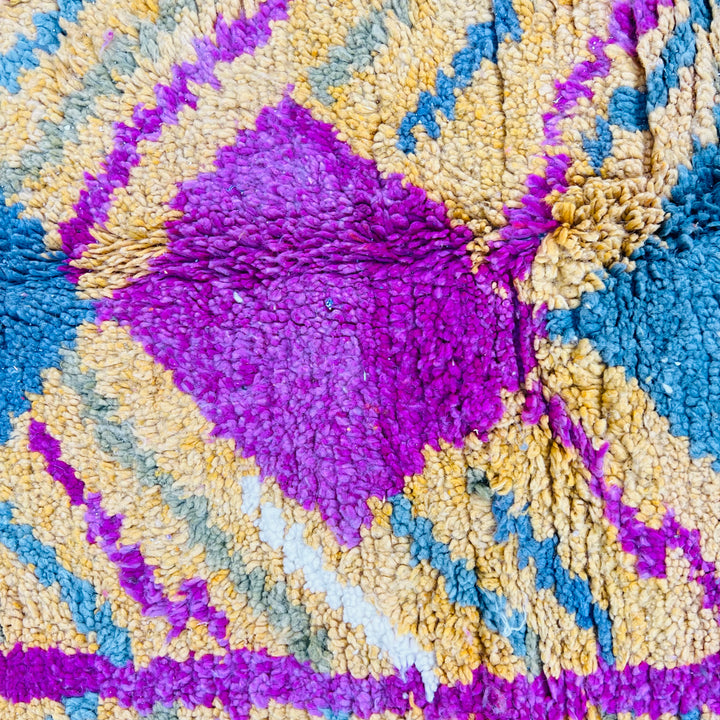 Colorful vintage Moroccan wool rug with ochre, fuchsia, teal, geometric design; traditional Berber style. Rug size: 8.1 ft x 5.2 ft.