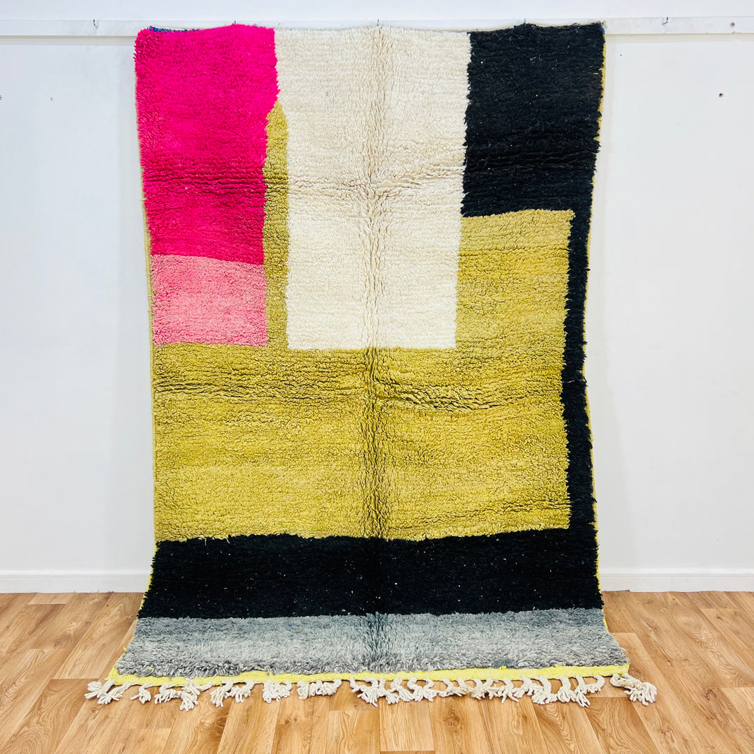 Bold abstract vintage Moroccan rug with blocks of mustard, black, white, hot pink, and grey. Handwoven wool, 8x10 area rug.