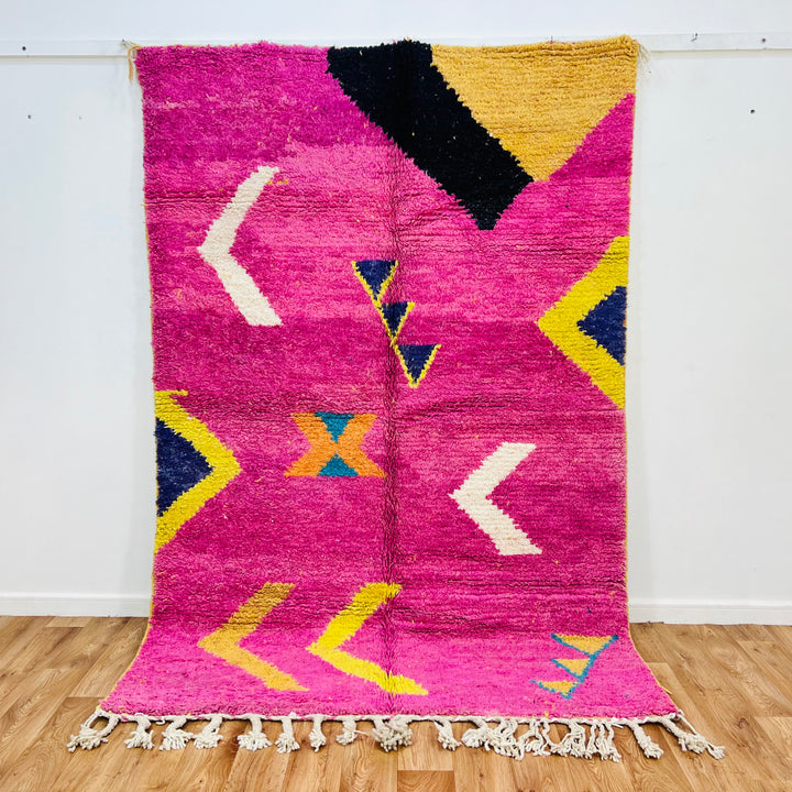 Vintage pink Moroccan Berber rug with geometric patterns and colorful accents, handmade wool, size 248x164 cm | Moroccan rugs for sale