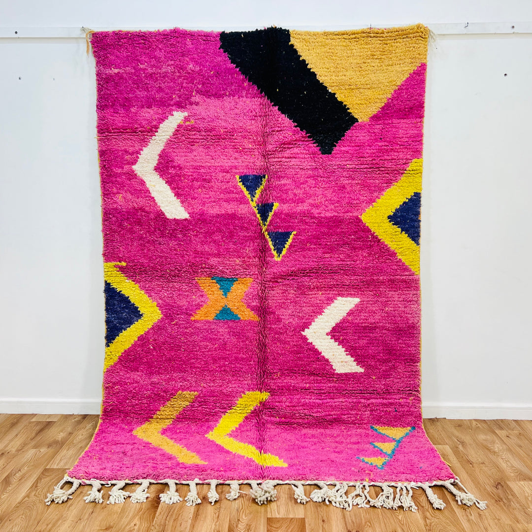 Vintage pink Moroccan Berber rug with geometric patterns and colorful accents, handmade wool, size 248x164 cm | Moroccan rugs for sale