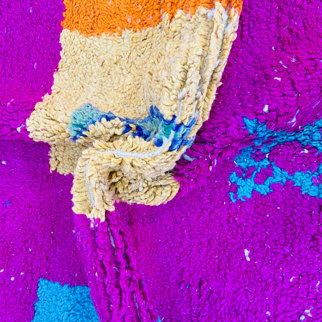 Bold Fuchsia Vintage Moroccan Rug with vibrant Berber symbols, 250x157 cm, Moroccan wool and tribal patterns, perfect for bohemian decor.