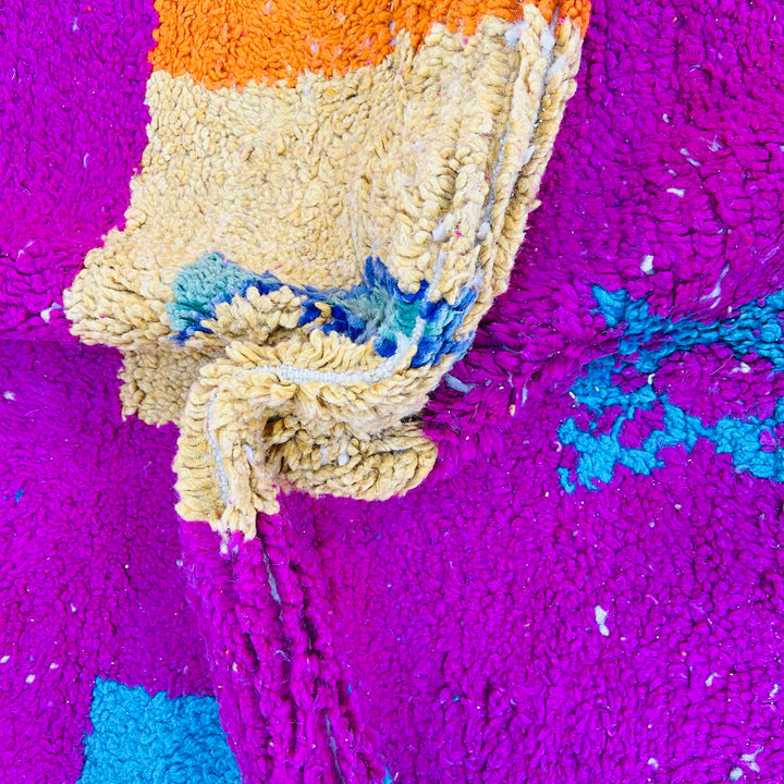 Vintage Moroccan wool rug with colorful Berber motifs in pink, orange, yellow, and teal – Rug 607, size 250x157 cm.


