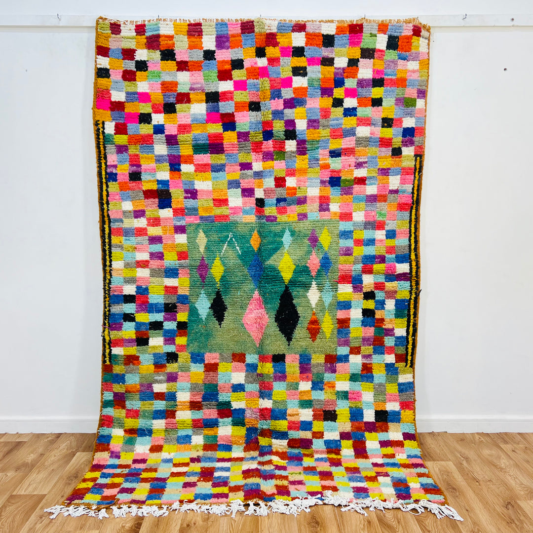 Vibrant vintage Moroccan rug with multicolored checkerboard and diamond motifs, handwoven by Berber artisans. Size: 237 x 158 cm.
