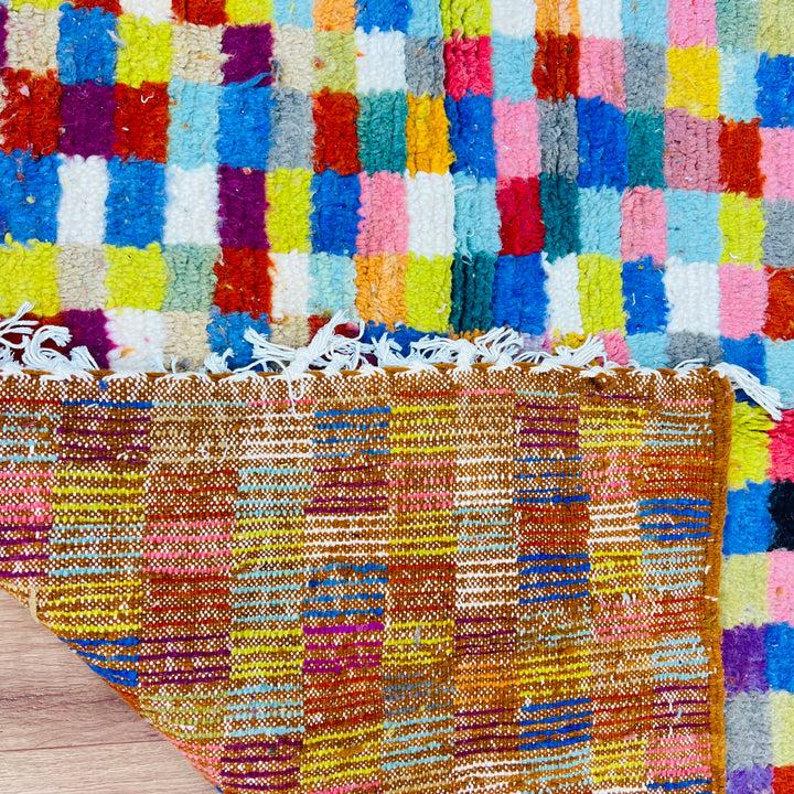 Colorful geometric vintage Moroccan rug with multicolored squares and diamond motifs, handwoven by Berber artisans, 237 x 158 cm.