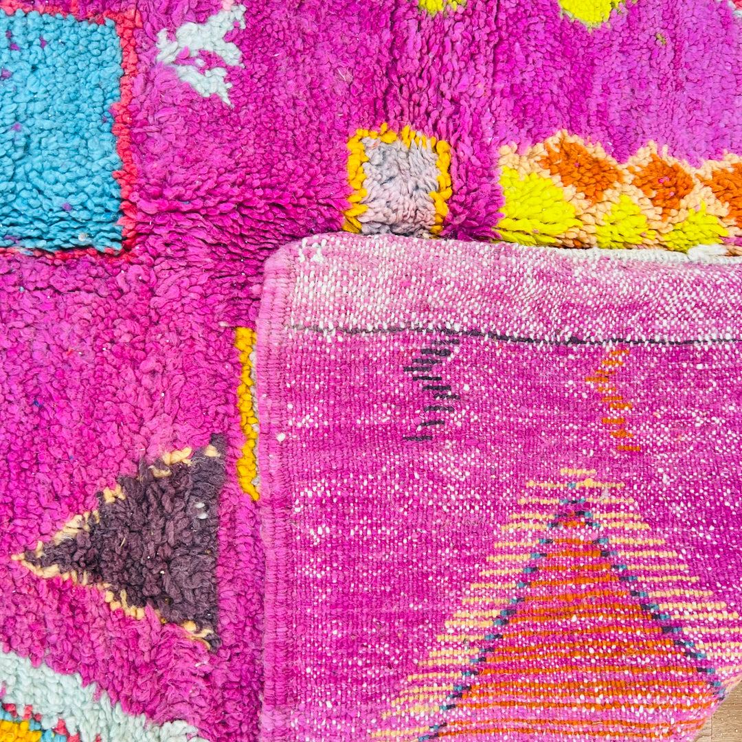 Vintage Moroccan rug with pink background, colorful diamond and cross motifs – Rug 644 (250x150 cm)

