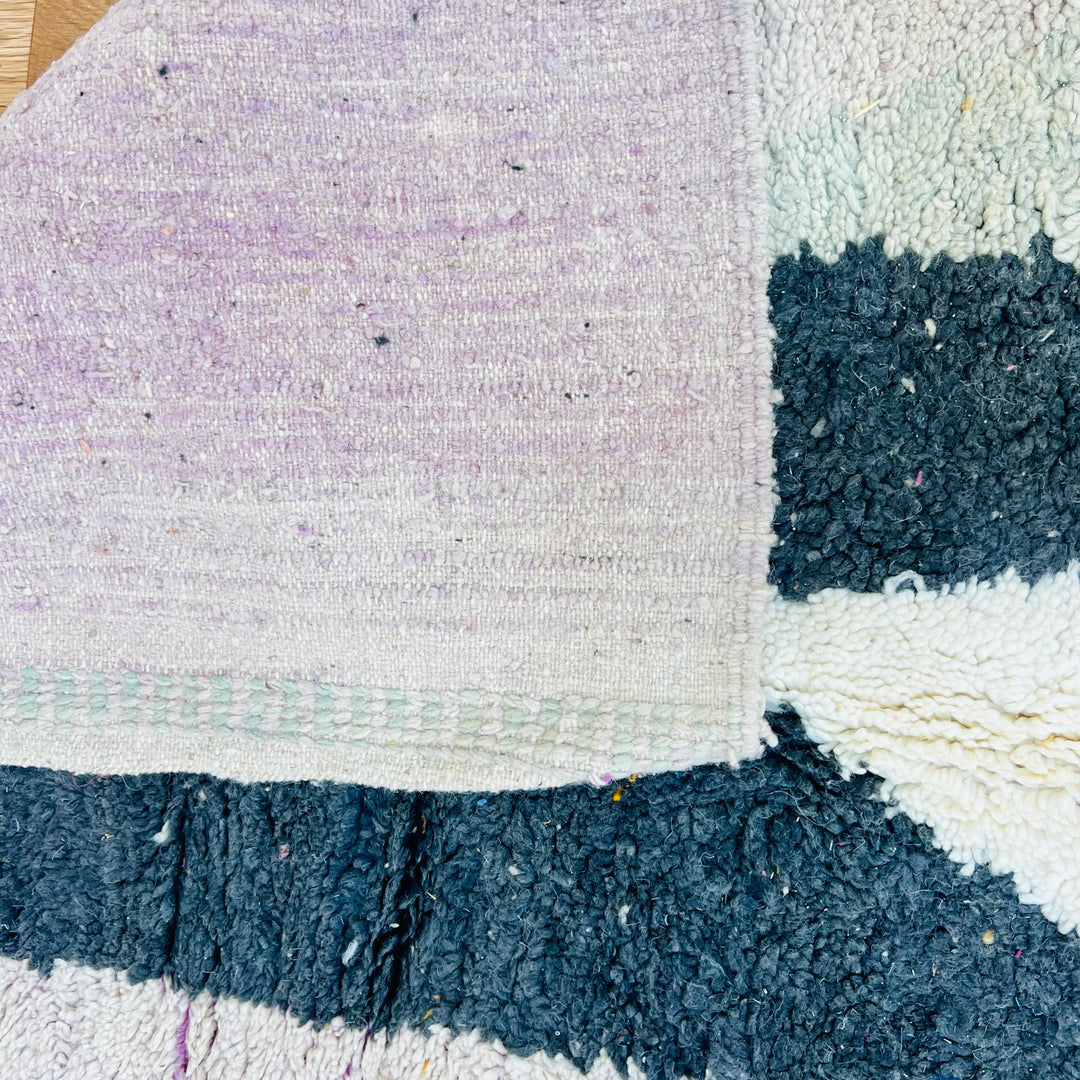 Vintage Moroccan wool rug 678 with abstract black and cream semi-circle design, handmade 260x155cm

