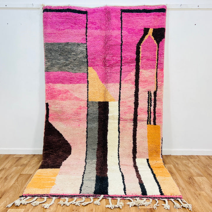 Vintage Moroccan rug 663 with pink, orange, and ivory abstract lines, handmade in wool.


