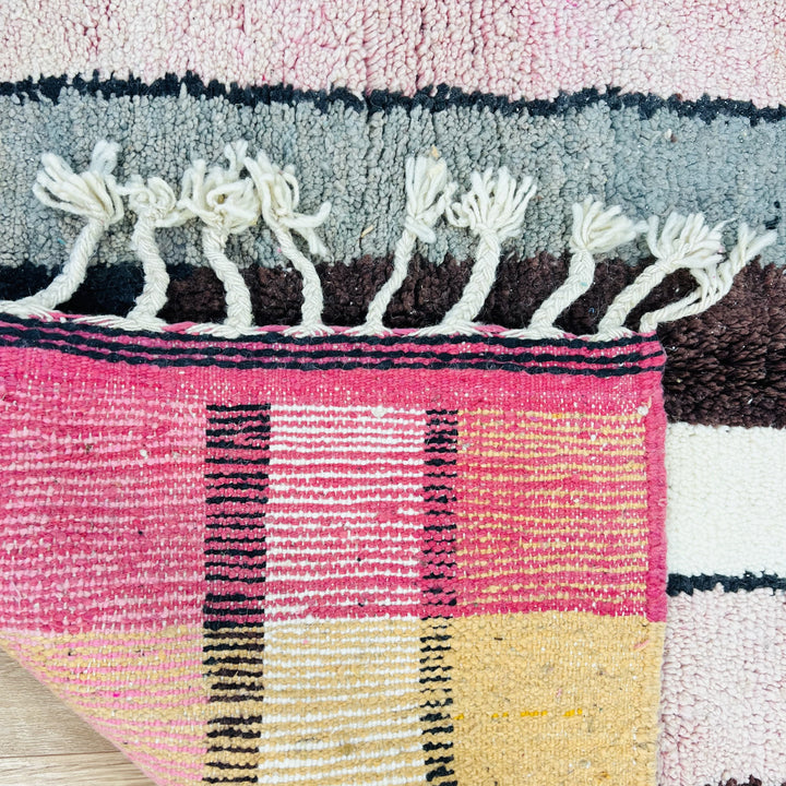 Vintage Moroccan rug 663 with pink, orange, and ivory abstract lines, handmade in wool.

